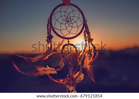 Dreamcatcher sunset , the mountains, boho chic, ethnic amulet,symbol Imagine de stoc © 