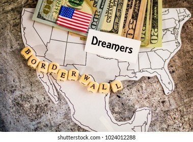 Dreamers Immigration Concept On Map With Border Wall Spelled Out