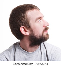 Dreaming. Man With Pensive Thoughtful Face In Profile Looking Away, Thinking About Something On White Isolated Studio Background, Portrait