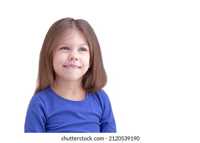 Dreaming Smiling Happy Biting Lip Child Kid Isolated On White Background, Looking Aside Waist Up Caucasian Little Girl Of 5 Years In Blue