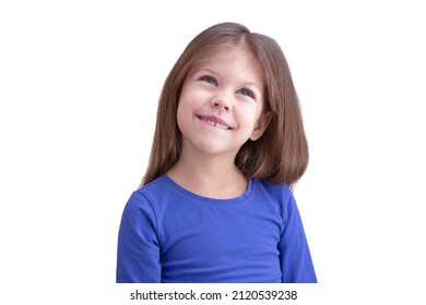 Dreaming Smiling Happy Biting Lip Child Kid Isolated On White Background, Looking Up Waist Up Caucasian Little Girl Of 5 Years In Blue