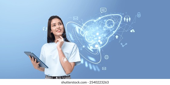 Dreaming woman holding tablet, glowing rocket with diverse business and marketing icons. Concept of project, social media, connection, technology and innovation - Powered by Shutterstock