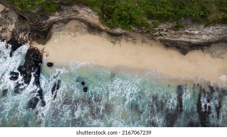 Dreamland Beach Bali Drone Aerial Top View. Beach With Rocky Cliff And White Sand