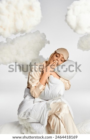 Image, Stock Photo Dreamy blond woman relaxing in bed, illuminated by sunlight