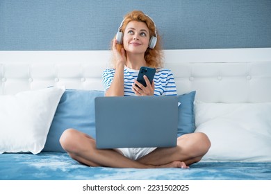 dreamy girl listening music on phone. music girl with phone. girl in headphones listen to music.