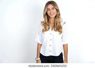 Dreamy rest relaxed Young caucasian business woman wearing white shirt over white background crossing arms, - Shutterstock ID 2325641253