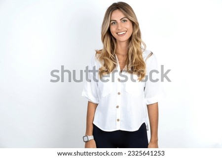 Dreamy rest relaxed Young caucasian business woman wearing white shirt over white background crossing arms,
