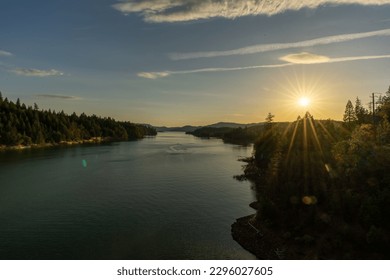 A Dreamy shot of the sun setting on Lost Creek Lake in Southern Oregon - Shutterstock ID 2296027605