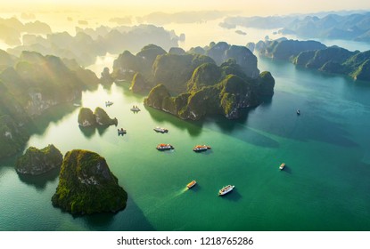 Dreamy sunset landscape Halong Bay, Vietnam view from adove. This is the UNESCO World Heritage Site, a beautiful natural wonder in northern Vietnam
 - Powered by Shutterstock