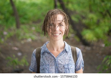 Drenched Woman In The Rain Forest In Summer