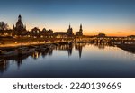  Dresden city skyline at Elbe river and Augustus Bridge at sunset , Dresden, Saxony, Germany. Panoramic evening view of Dresden.