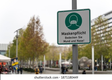 DRESDEN, GERMANY - 10. Dezember 2020: "Maskenpflicht" sign in the city on Prager Strasse due to Covid measures to wear a coronavirus face mask