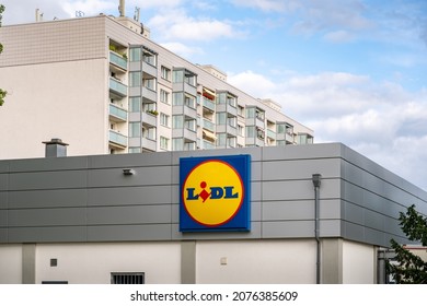 DRESDEN, GERMANY - 16. August 2021: Lidl Supermarket In Front Of A Residential Building In The City. Famous Grocery Store With A Big Logo On The Facade. Food Discounter In Europe.