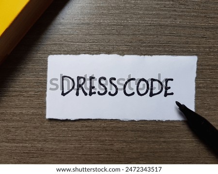 Dress code writting on table background.