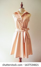 Dress isolated on white polka dot dress cream pink dot vintage retro sundress on sewing dress form tailor made diy clothing by talent dressmaker ,fashion design fabric material online clothing shop