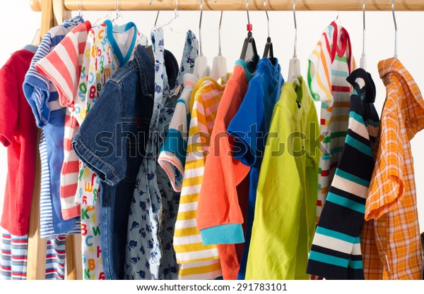 Dressing Closet Clothes Arranged On Hangerscolorful Stock Photo