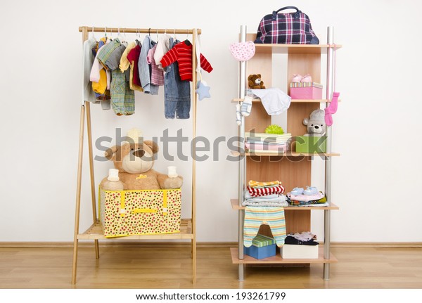 Dressing Closet Complementary Clothes Arranged On Stock Photo