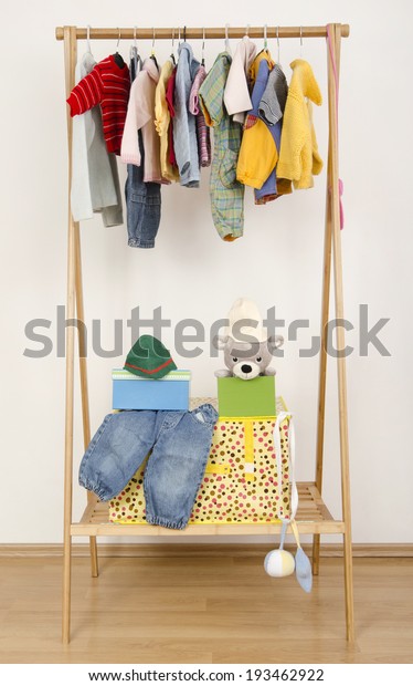 Dressing Closet Complementary Clothes Arranged On Stock Photo