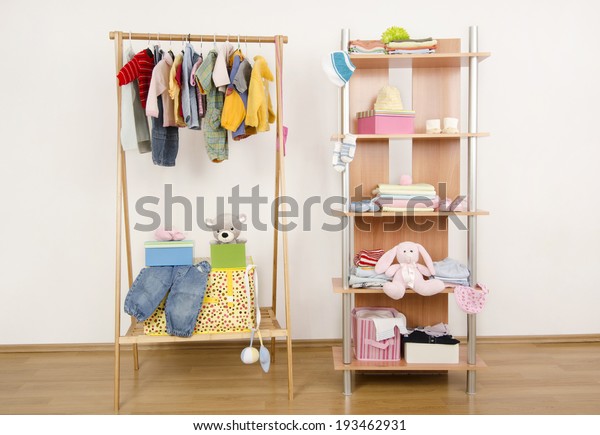 Dressing Closet Complementary Clothes Arranged On Stock Photo