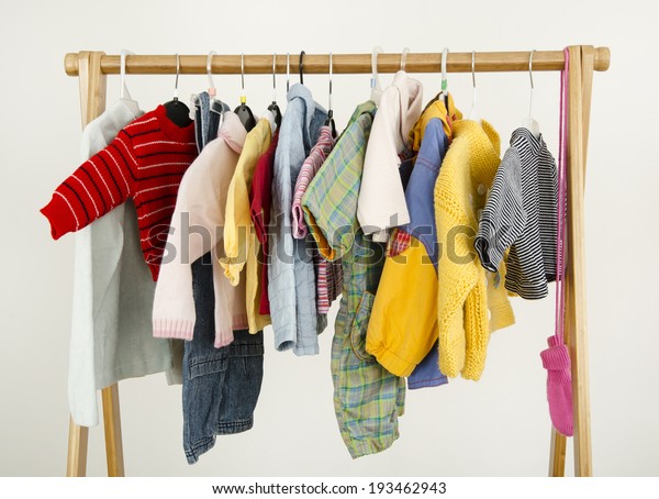 Dressing Closet Complementary Clothes Arranged On Stock Photo