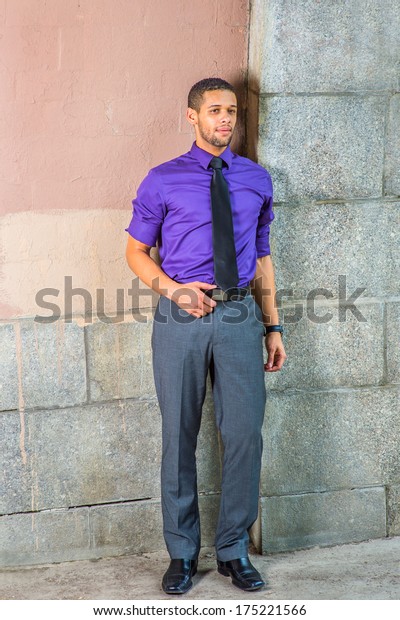 grey pants and purple shirt