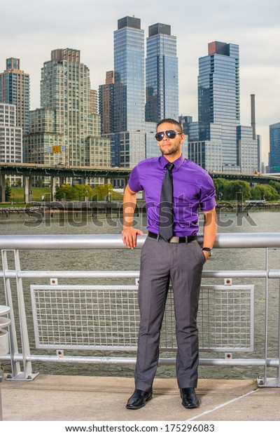 grey pants and purple shirt