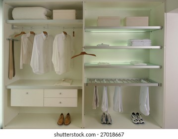 dressing room with  shirts, pants  and shoes - Shutterstock ID 27018667