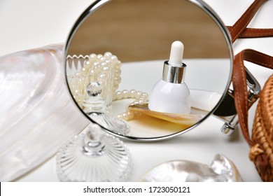 Dressing Table With Luxury Cosmetic And Skincare Set, Cosmetic Bottle Containers With Marine Pearl Extraction Essence, Blank Label For Organic Branding Mock-up, Natural Beauty Product.