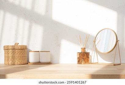 Dressing table top with round mirror, aroma sticks and containers on blurred abstract texture wall background in soft window sunlight shadows