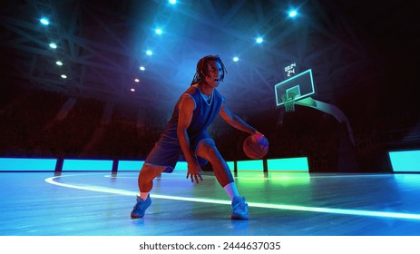 Dribbling. Motivated young man, basketball player in motion with ball against neon colored stadium with spotlights. Concept of sport, action, game, competition, tournament, energy. Poster, ad - Powered by Shutterstock