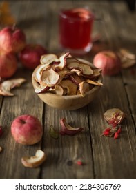 Dried Apples In Bowl On Wooden Table On Background Compote In Glass. Autumn Drink. Still Life