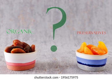 Dried Apricot Comparison. Apricot With Preservatives (E220 Sulfur Dioxide) And Organic Fruit Without. Color Difference. Dehydrated Food In Bowls.
