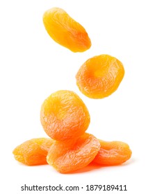 Dried apricots fall on a bunch on a white background. Isolated