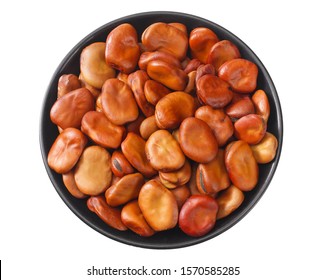 Dried Broad Beans In Black Bowl Isolated On White Background. Top View