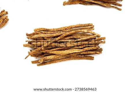 Dried brown Codonopsis root sticks used in Chinese herbal medicine.