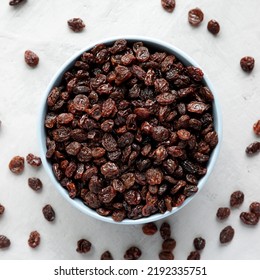 Dried Brown Raisins In A Bowl, Top View. Flat Lay, Overhead, From Above. 