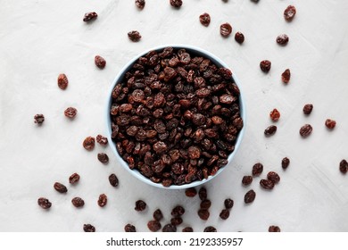 Dried Brown Raisins in a Bowl, top view. Flat lay, overhead, from above.  - Shutterstock ID 2192335957