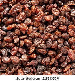 Dried Brown Raisins, Top View. Flat Lay, Overhead, From Above. Close-up.