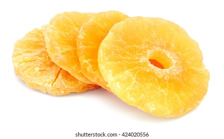 Dried candied pineapple rings isolated on white background. - Shutterstock ID 424020556