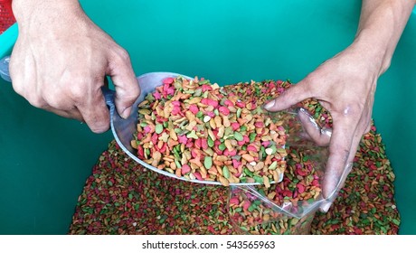 Dried Cat Food,the Man Fill It In To Plastic Bag.