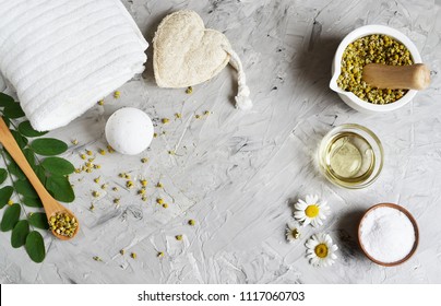Dried chamomile flowers, natural ingredients for homemade body, face salt scrub, mask, SPA concept