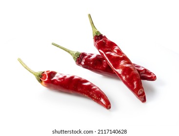 Dried chili peppers on a white background. Dried spices. - Powered by Shutterstock