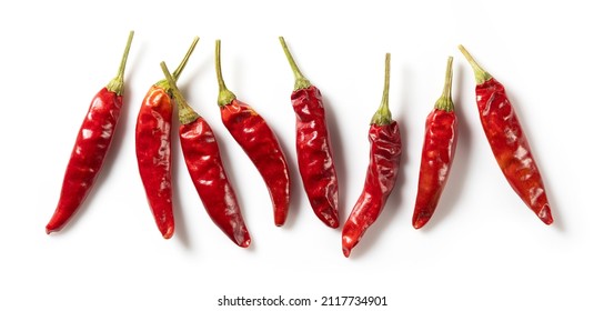 Dried chili peppers placed on a white background. View from directly above. - Powered by Shutterstock