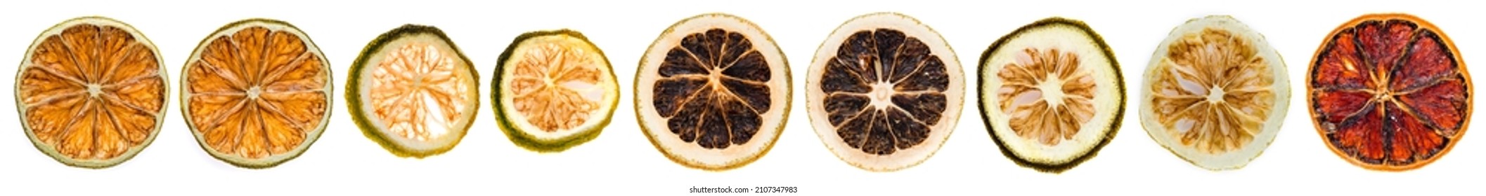 Dried Citrus Slices Orange Lemon And Lime. Slices Of Dried Lemon For Decoration. Lime Laid Out On A White Background