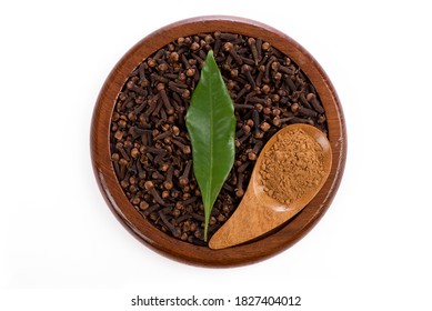 Dried Clove Flowers ,powder And Green Leaf Isolated On A White Background.