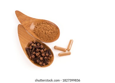 Dried Clove Flowers And Powder Isolated On A White Background.