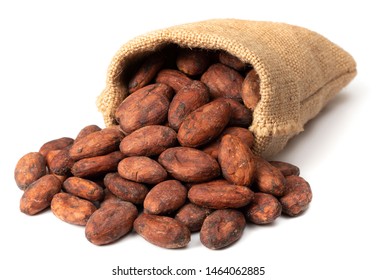 Dried Cocoa Beans In The Sack, Isolated On White Background