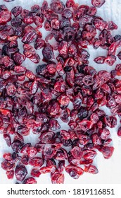 Dried Cranberries On Table Top. Overhead View With Vertical Composition.