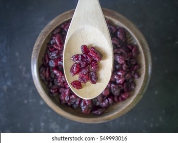 Dried Cranberries Overhead Shot On Dark Rustic Background