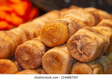 Dried Crushed Caramelized Figs At Eastern Market In Washington (USA), Selective Focus On The Center Of The Image.